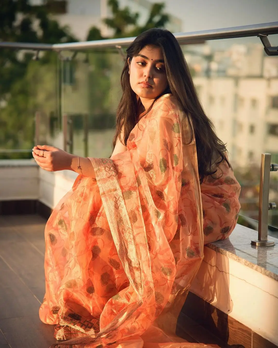 Gargeyi Yellapragada Smiling Face Long Hair Orange Saree